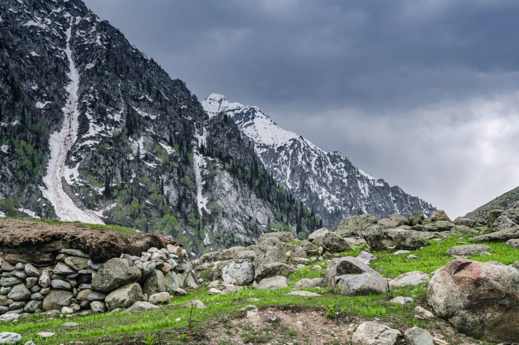 gray rocky mountain under white sky