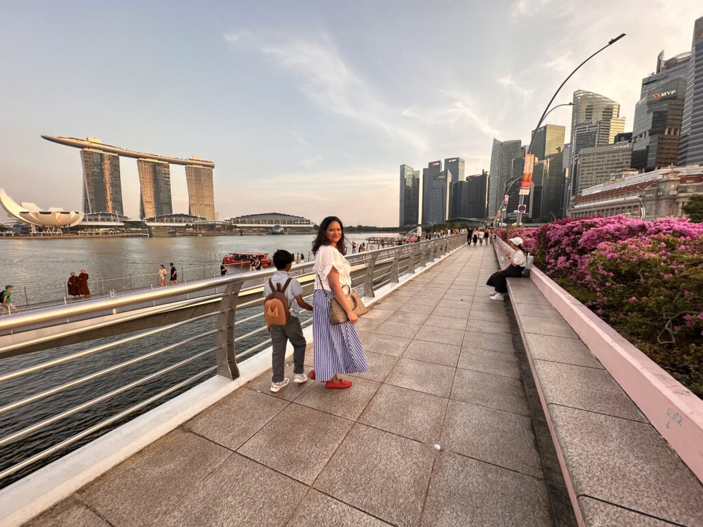 Posing at Jubilee Bridge Merlion Park Singapore 